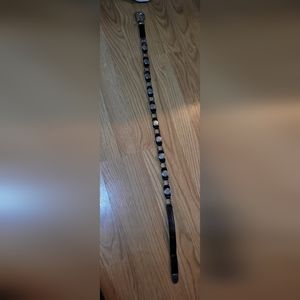 Size small 1901 Black leather & silvertone belt.